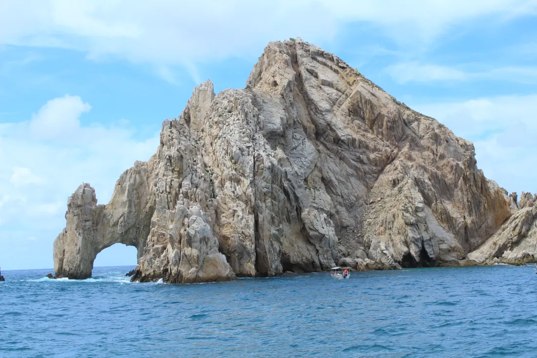 The rock arch at Land’s End, Cabo San Lucas, rising from deep blue water